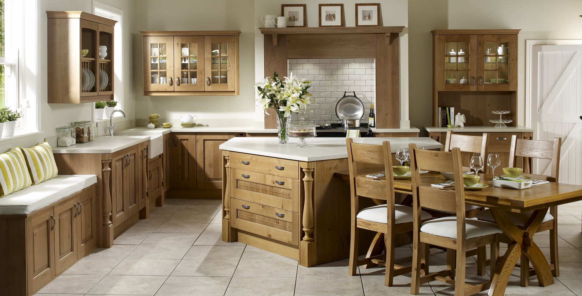 Oak panels and choice of marble and stone worktops. 