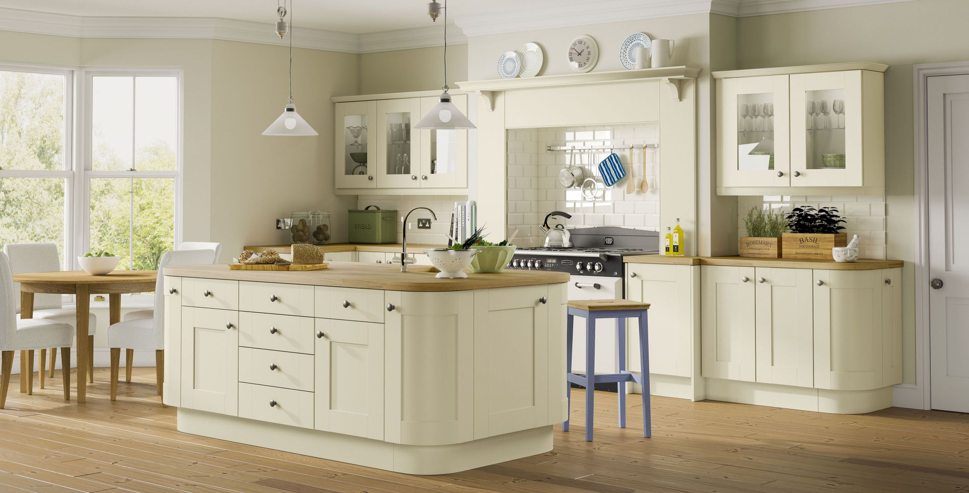 Oak worktops with feature island and glass and wood fronts. 