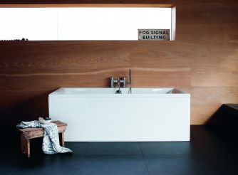 White double-ended fitted bath. 