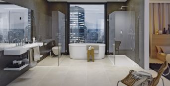 Washbasin with towel rail and wash top with bath tub. 